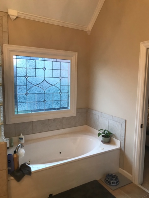 bathroom tub with window