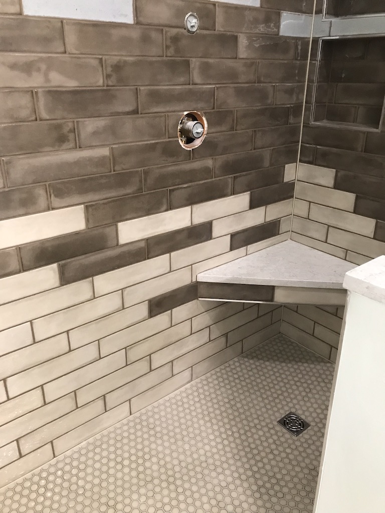 modern shower with corner shelf